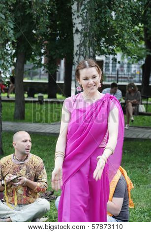 Perm, Russia - Jun 10, 2012: Krishna Worshipers Dance And Sing In Square Of Ural Volunteers.
