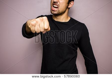 Angry Man Throwing A Punch