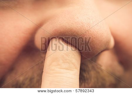 Closeup Finger Nose