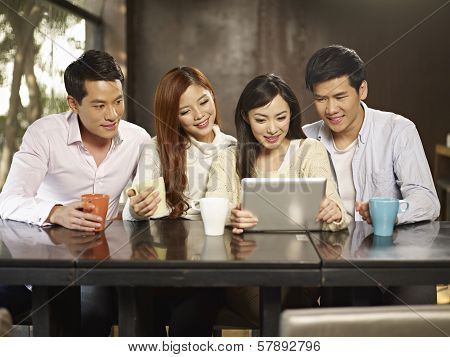 Friends Gathering In Cafe