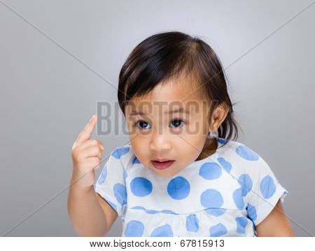 Baby girl frighten with finger