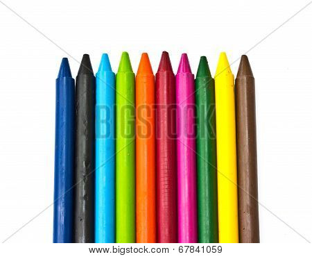 Multicolored Crayons On A White Background.