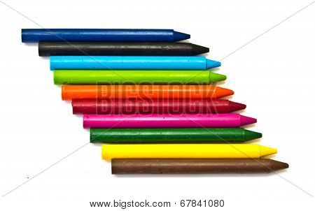 Multicolored Crayons On A White Background.