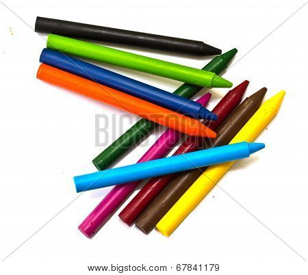 Multicolored Crayons On A White Background.