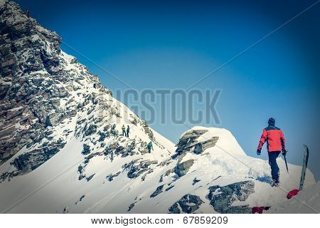 Person Ascendind A Mountain