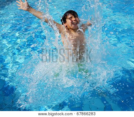 Happy little boys enjoying relaxing and splashing in water