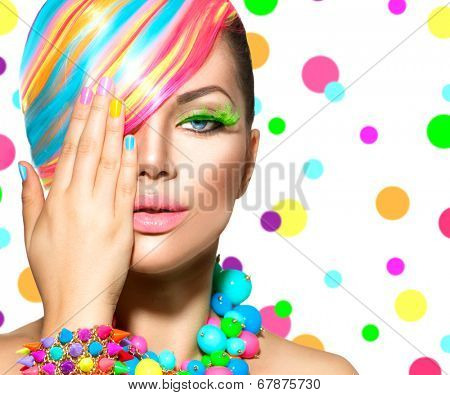 Beauty Girl Portrait with Colorful Makeup, Hair, Nail polish and Accessories. Colourful Studio Shot of Stylish Woman. Vivid Colors. Manicure and Hairstyle. Rainbow Colors 