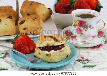 English cream tea with scones and strawberries