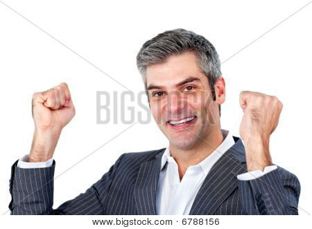 Joyful Businessman Punching The Air In Celebration