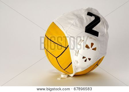 waterpolo ball in hat