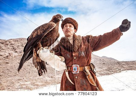 Nura, Kazakhstan - February 23: Eagle On Man's Hand In Nura Near Almaty On February 23, 2013 In Nura