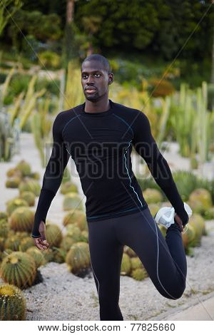 Dark-skinned runner at workout, healthy lifestyle concept