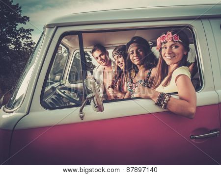 Multi-ethnic hippie friends on a road trip
