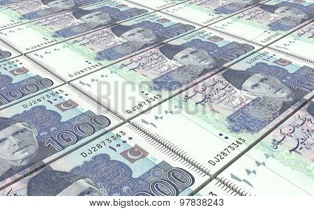 Pakistan rupee bills stacks background.