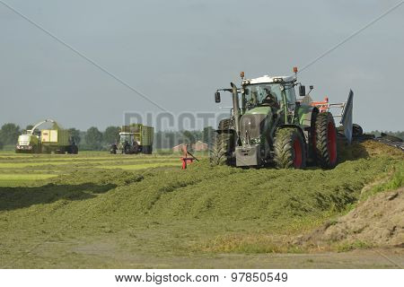 Agriculture, Cut Grass Chopping And Silage With Tractors.