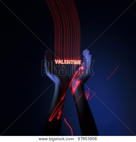 Light Painting Photography. Freezelight Photo. Hands Holding A Glowing Message With Freezelight Effe