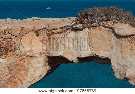 Picturesque View Of A Natural Rock Bridge At Sea Coast