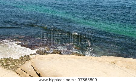 Striping of blue and aqua colors in ocean waters