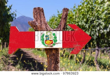 Peru Flag wooden sign with winery background