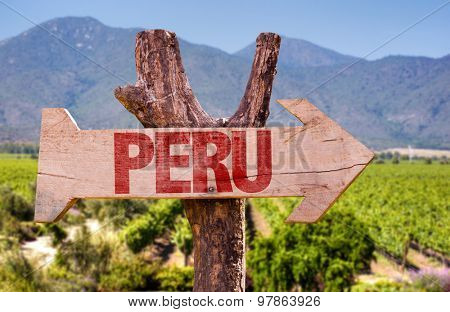 Peru wooden sign with winery background
