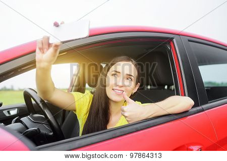 Woman taking selfie picture.