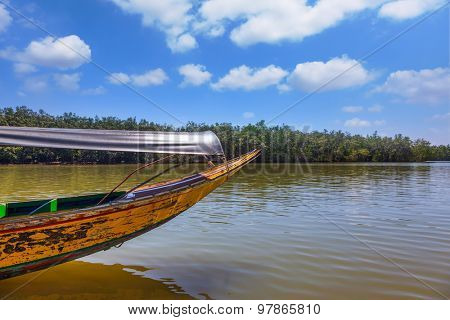  Marshy channels and mangrove thickets in Thailand. Spring trip to native boat Longtail