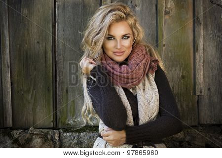 Young Girl Smiling In Autumn Scenery