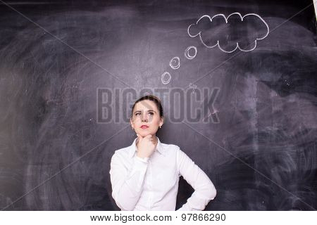 Woman thinking blackboard concept