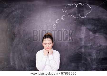 Woman thinking blackboard concept