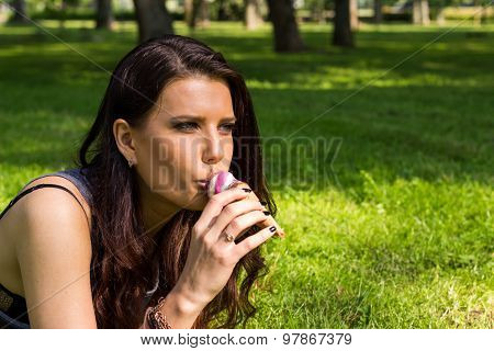 Beautiful girl eat ice-cream, outdoors