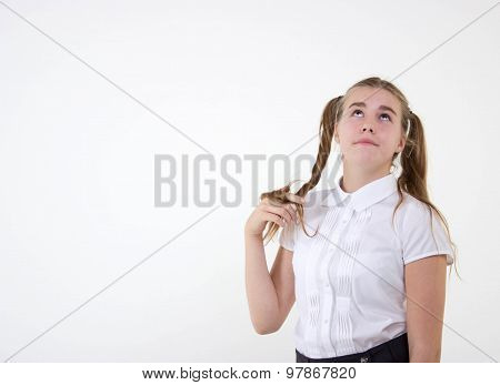 Schoolgirl thinking isolated on white background