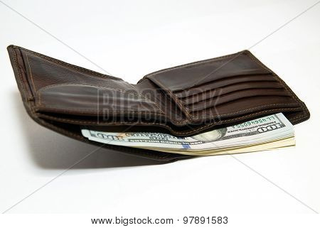 Old Wallet With Banknotes Of Us Dollars Inside