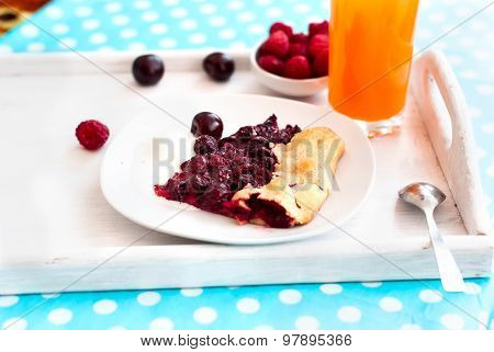 Biscuit With Cherries And A Glass Of Juice