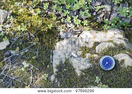 Analogic Compass Abandoned on the stone