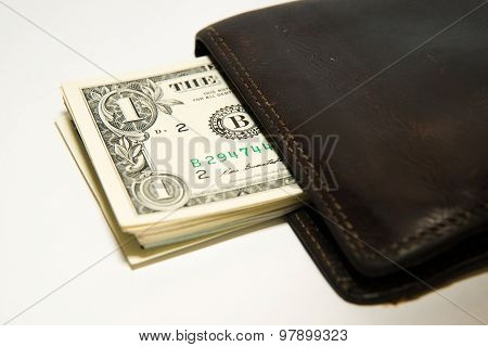 Old Wallet With Banknotes Of Us Dollars Inside