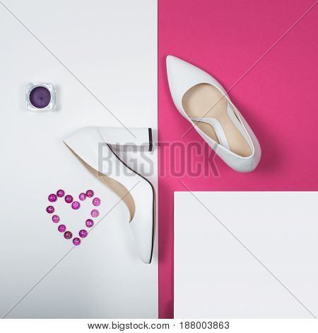 Shoes fashion. Stylish Trendy white heels on a pink background. Summer fashion Outfit, Luxury Party shoes. Minimal fashion concept.