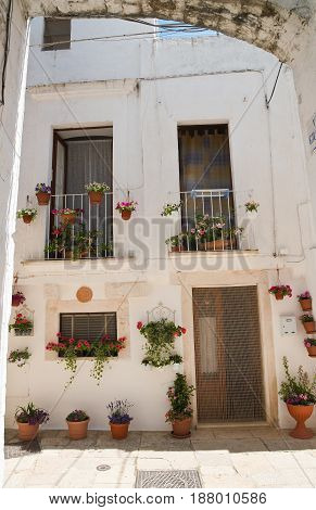 Characteristic alleyway of Cisternino. Puglia. Southern Italy.