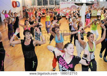 People Dancing During Zumba Training Fitness At A Gym