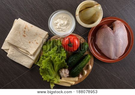 Shaurma ingredients composition on a wooden background