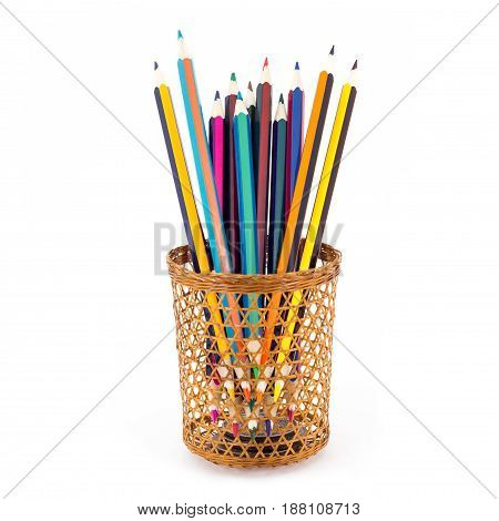 Colored Pencils Are Visible Through A Wicker Glass