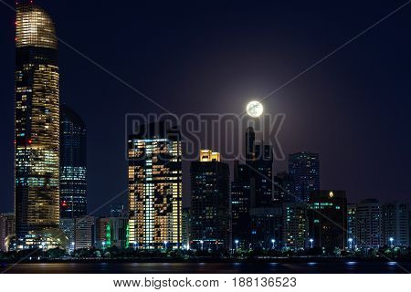 Full moon. Night in city Abu Dhabi