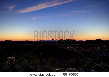 The desert just after sunset with North Phoenix below.