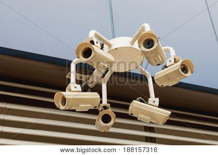 Multi-camera tracking device. Outdoor surveillance camera. Singapore.