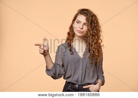 woman biege background curly hair blouse copy space