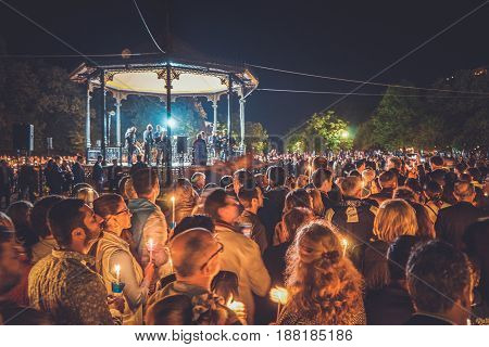 People Holding  Candle At Night In Spianada Square In Corfu Greece, During The Easter Celebrations