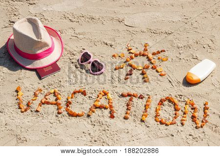 Word Vacation, Accessories For Sunbathing And Passport At Beach, Concept Of Summer Time