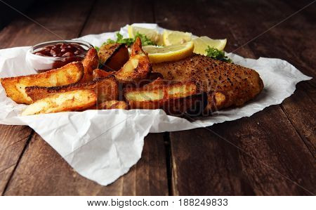 traditional British fish and chips on white paper