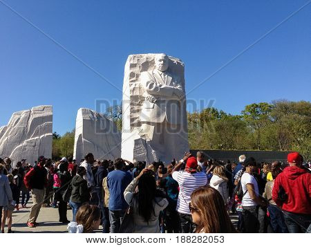 Washington DC - April 7 2012: Tourists around the Martin Luther King Junior Memorial in Washington DC