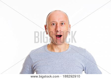 Young Man Looking Amazed In To The Camera