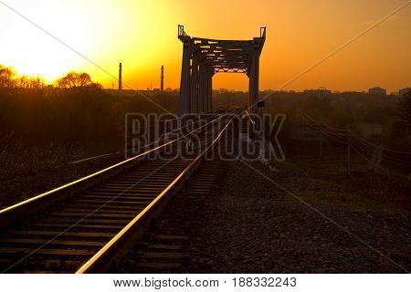 Railway bridge over the river at sunset. The river Sviyaga Ulyanovsk Russia.